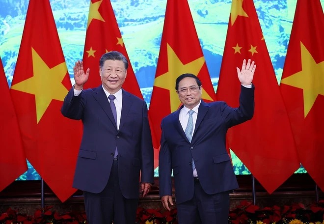 Thủ tướng Phạm Minh Chính và Tổng Bí thư, Chủ tịch nước Trung Quốc Tập Cận Bình chụp ảnh chung. (Ảnh: Dương Giang/TTXVN)